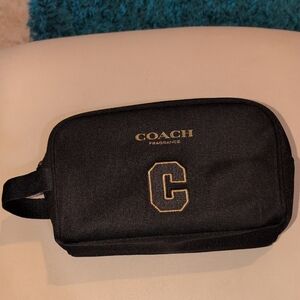 Coach Black and Gold Toiletry Bag